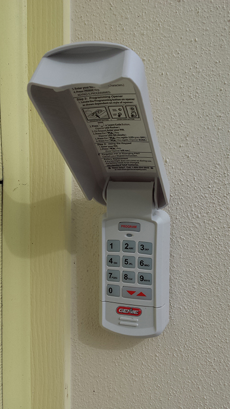 picture of the garage door opener showing code pad